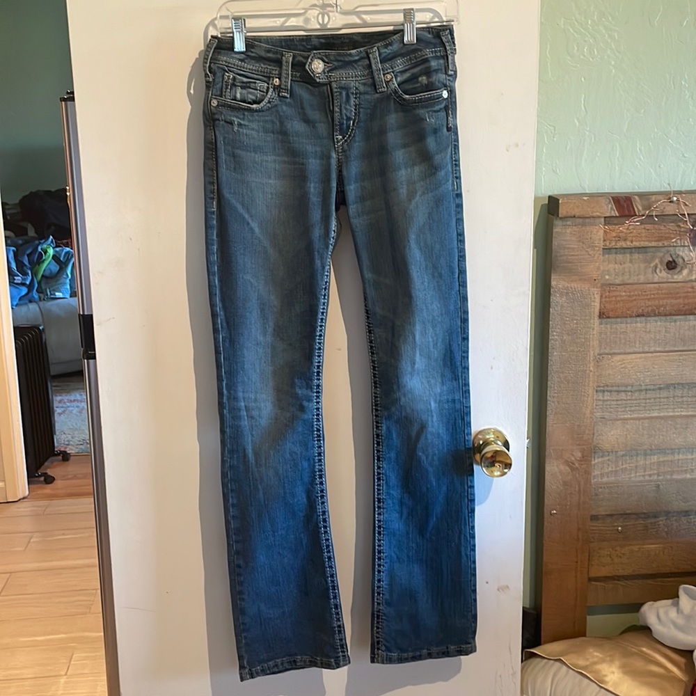 Silver low rise bootcut jeans